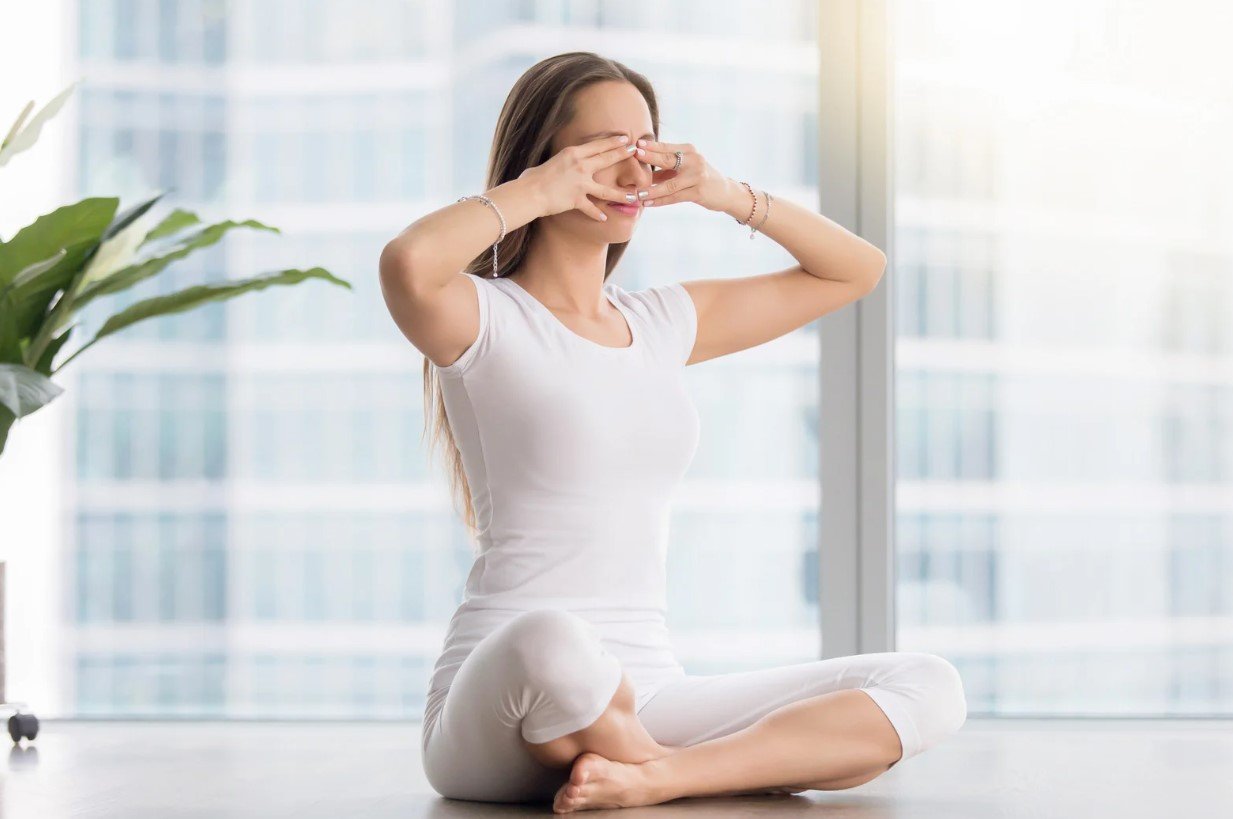 A student practicing a calming humming breath