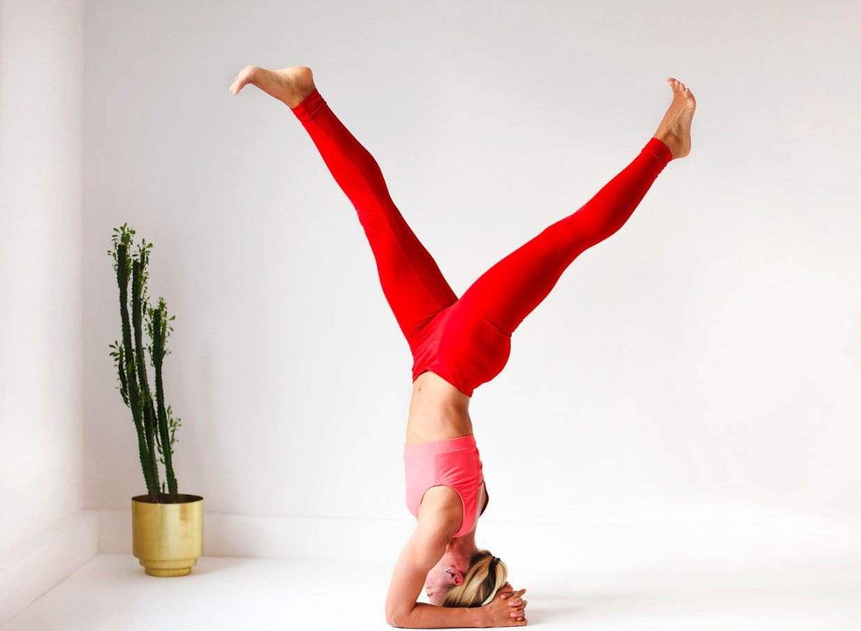 A student practicing a standing balance pose