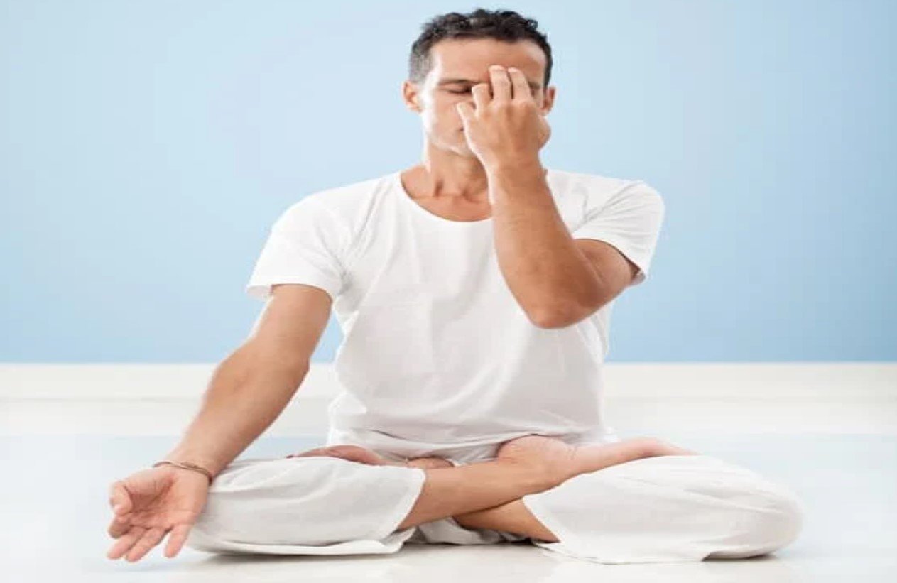 A student practicing a soft, steady meditative gaze