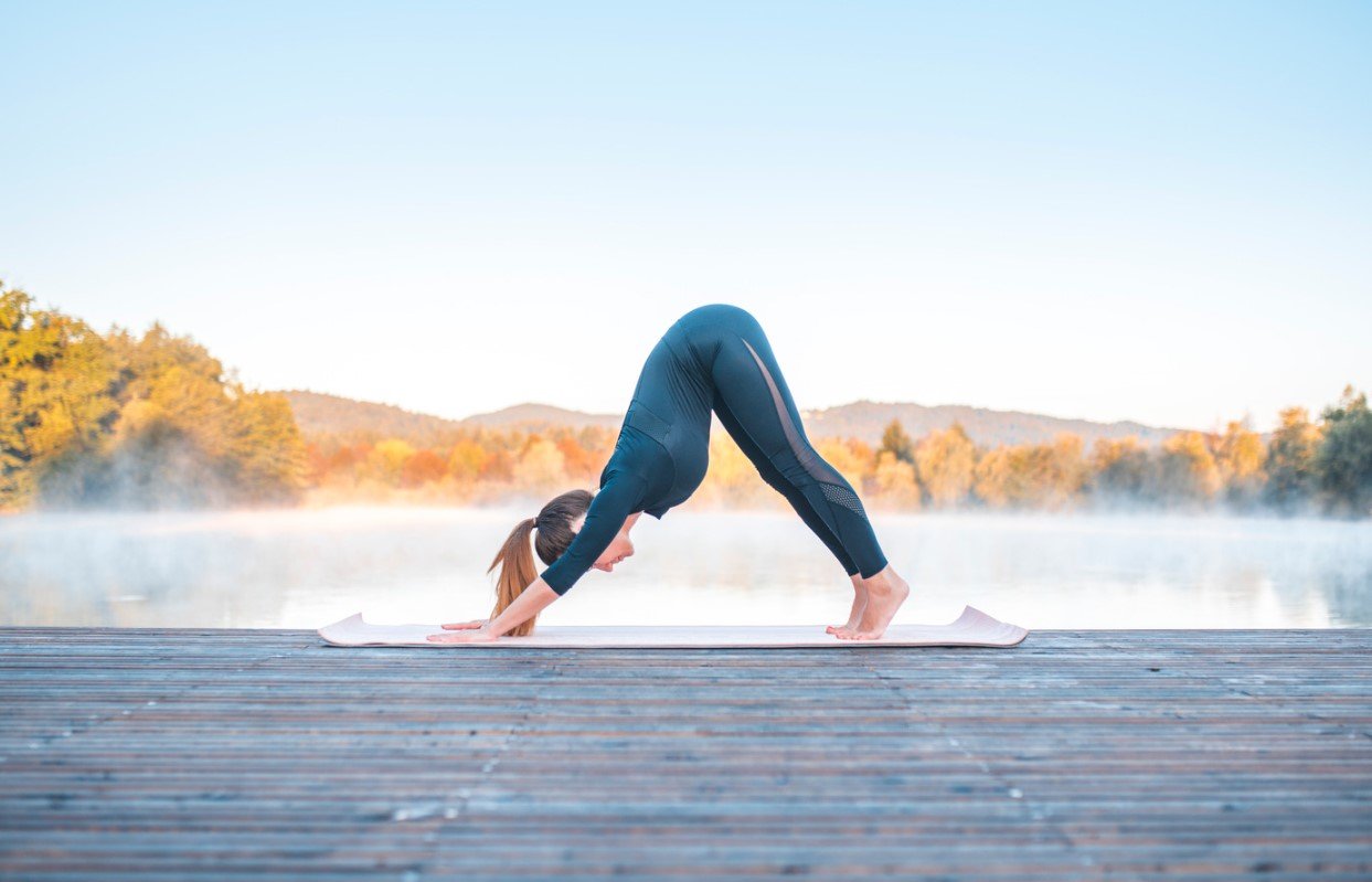 A student practicing Legs Up the Wall, a gentle inversion